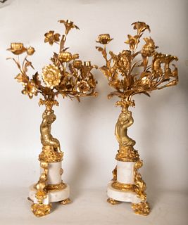 Large Garrison with table clock and pair of cherub candlesticks in Marble and gilt bronze, French school of the 19th century
