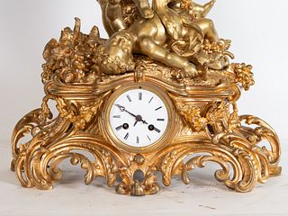 Large Gilt Bronze Clock with motifs of Cherubs playing, 19th century French school