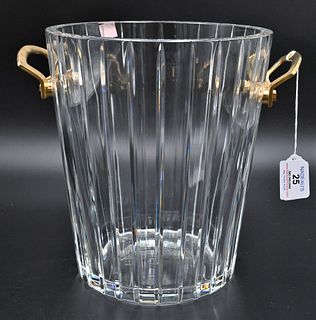 Baccarat Crystal Ice Bucket, having brass handles, height 9 inches, diameter 8 inches.