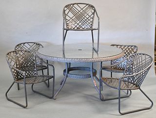Seven Piece Outdoor Set, to include round wicker table with glass top, four round back chairs, one flat top, along with one lounge; table height 30 in