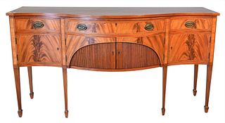 Margolis Mahogany Sideboard, having serpentine front with three drawers over four drawers, two center faux tambour doors, all set on reeded square tap