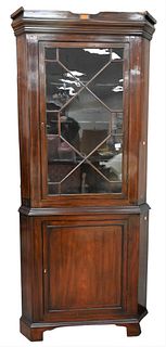 George IV Mahogany Corner China Cabinet, in two parts, (top crest broken), height 86 1/2 inches.