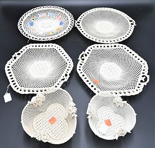 Six Piece Belleek Group, to include a pair of hexagon four strand plates, diameter 10 inches; a round plate, all having impressed marks; a round flag 
