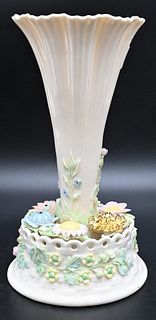 Belleek Center Vase, having painted round base encrusted with flowers, green mark on bottom, height 11 inches. Provenance: Collections of Norma Reilly