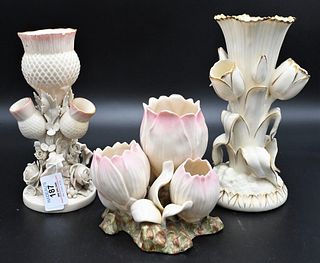 Three Belleek Tulip Vases, to include a triple tulip in low form with painted base, height 5 1/4 inches; along with two quadruple tulip vases, tulip w
