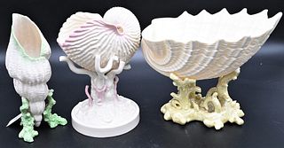 Three Belleek Shell Compotes, to include Nautilus with pink painted shell and coral, height 8 inches, having black mark; Imperial shell vase resting o