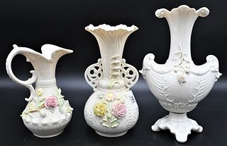 10 Belleek Urns and Vases, to include 4 painted with encrusted flowers; 4 having black marks; 2 green; along with 4 brown; tallest 10 1/2 inches. Prov
