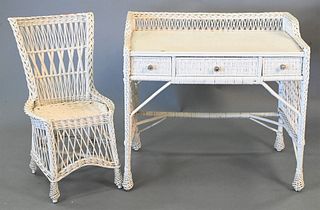 Two Piece Wicker Desk and Chair, height 33 1/2 inches, width 38 inches, depth 23 inches. Provenance: An estate from Redding, CT.