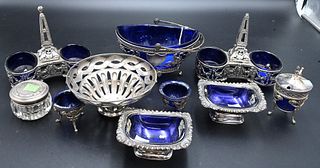 Cobalt Lined Lot, to include a pair of Sheffield silver plated salts, silver sugar with swing handle, along with a pair of double salts, etc.