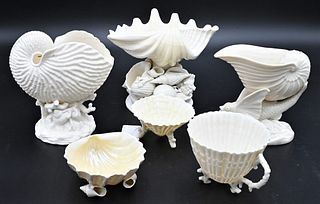 Six Belleek Shell Form Pieces, to include three compotes on shell and fish bases, along with three small shell dishes; all with black or blue marks; t