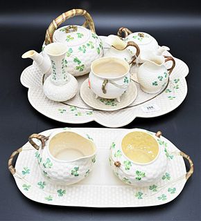 Belleek Shamrock Tea Set, to include two teapots, creamers, sugars, along with trays, having black mark. Provenance: Collections of Norma Reilly, New 