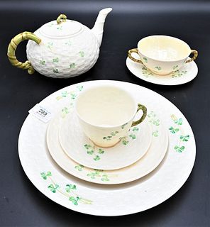 93 Piece Set of Belleek Shamrock, to include plates, cups, saucers, vases, teapots, sugars, creamers, etc., all with green mark on bottom. Provenance: