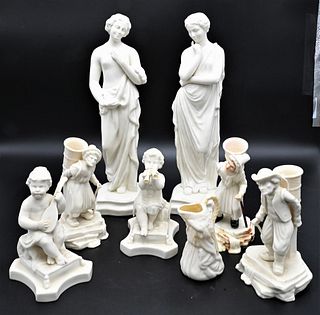 Figural Belleek Group, to include cherub, three figures with basket vases, along with two tall figures, height 12 inches. Provenance: Collections of N