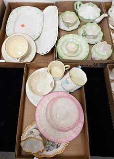 Three Tray Lots of Belleek, to include a tea set, cups, saucers, platters, etc. Provenance: Collections of Norma Reilly, New Jersey.