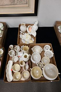 Three Tray Lots of Belleek, to include wall pockets, creamers, sugars, along with vases; all having black marks. Provenance: Collections of Norma Reil