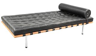Ludwig Mies Van Der Rohe Barcelona Daybed, having black leather cushion with bolster, on mahogany chrome frame with black leather straps, 38" x 76".