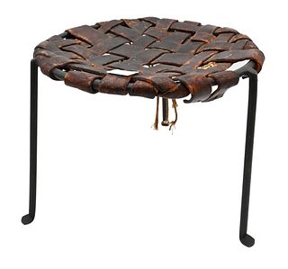 Lila Swift and Donald Monell Stool, iron with leather wrapped round top, height 12 inches, diameter 5 1/2 inches.