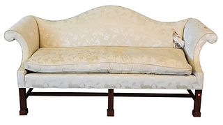 Chippendale Style Sofa, having camelback, attributed to Baker, (large tear on right back), height 38 inches, length 78 inches.