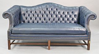 Chippendale Style Camelback Sofa in Blue Leather Upholstery having tufted back and arms on square molded legs, height 37 inches, length 80 inches.