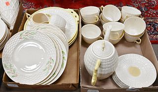 Two Tray Lots of Belleek, with brown mark, to include teapot with cups, saucers, teapot, creamer, sugar, mismatched plates. Provenance: Collections of