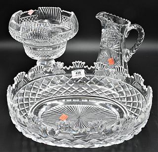 Three Cut Glass Pieces, to include a large compote, height 8 1/2 inches; large oval bowl length 13 1/2 inches; along with a pitcher. Provenance: Colle