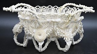 Belleek Porcelain Rathmore Basket, open reticulated center raised on branch legs, encrusted with garland, having large flowers, (repaired), height 5 1