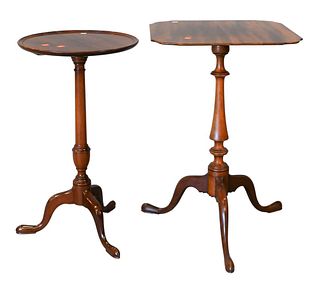 Two Mahogany Margolis Stands, one with dish top and one with shaped top, both set on tripod base, height 27 inches and 26 inches.