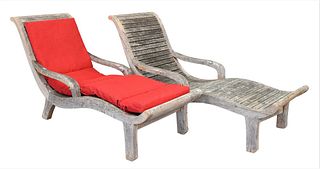 Pair of Teak Lounges, having shaped design with custom cushions, (not adjustable), length 66 inches.