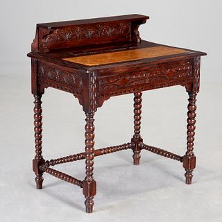 Jacobean Revival carved oak writing desk