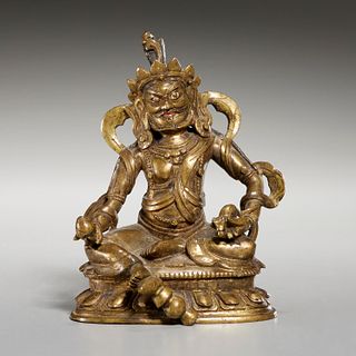 Tibetan bronze figure of Jambhala, ex-museum