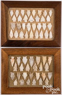 Two wood frames, containing prehistoric points