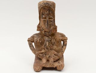PRE-COLUMBIAN STYLE POTTERY FIGURE OF A FEMALE