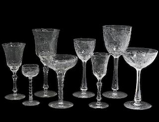 FIFTY-EIGHT PIECE ASSEMBLED ENGRAVED GLASS PART STEMWARE SET