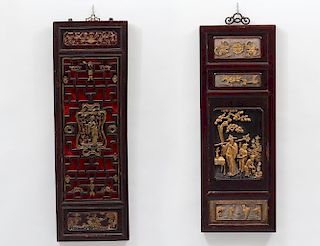 TWO CARVED, GILT AND PAINTED WOOD PANELS