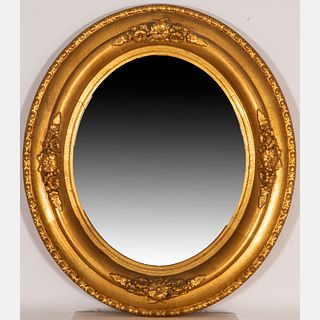 An American Gilt Framed Oval Mirror