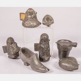 A Group of Pewter Ice Cream Molds