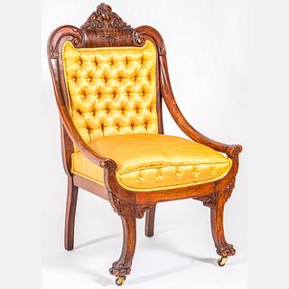 A Victorian Carved Mahogany Parlor Chair