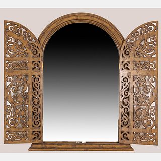 A Maitland Smith Carved Hardwood Mirror