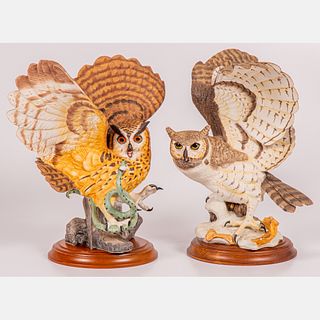 A Franklin Mint Porcelain Eagle Owl and Horned Owl.