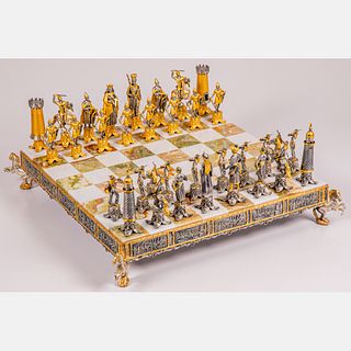 An Italian Gilt Metal and Marble Chess Set