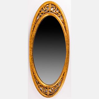 A Vintage Gilt Framed Oval Mirror