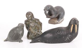 A Group of Inuit Stone Sculpture