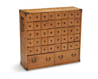 A Japanese kiri wood apothecary cabinet