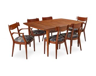 A Drexel "Declaration" modern walnut dining table with chairs