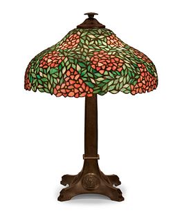 A Bradley & Hubbard table lamp with a leaded glass shade