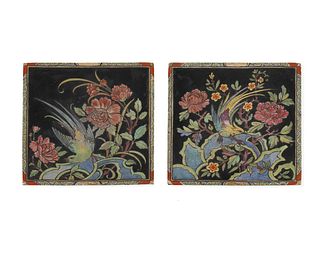 A pair of art pottery tiles