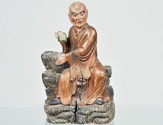 CARVED AND PAINTED WOOD FIGURE OF AN OFFICIAL