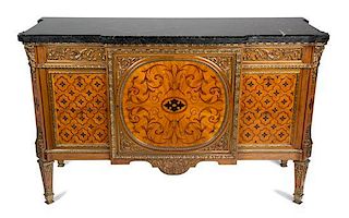 A Louis XVI Style Gilt Bronze Mounted Marquetry Commode Height 35 1/4 x width 57 x depth 21 inches.