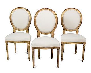 A Set of Eight Louis XVI Style Giltwood Dining Chairs Height 40 inches.