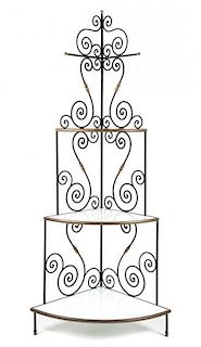 A French Iron and Brass Corner Baker's Rack Height 78 1/2 x width 20 x depth 20 inches.